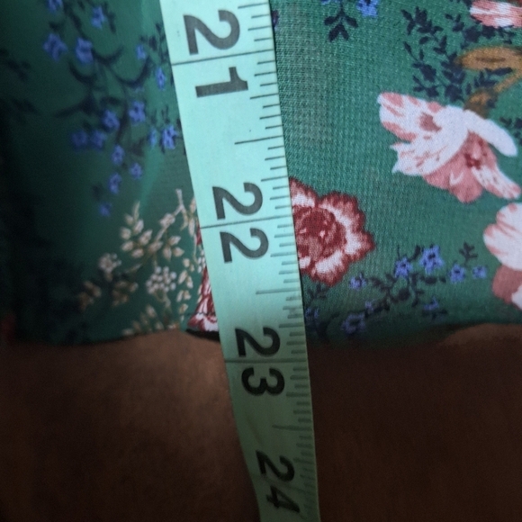 A Lulu's long sleeve sheer button-down floral top with ruffled sleeves in small. - Picture 5 of 7